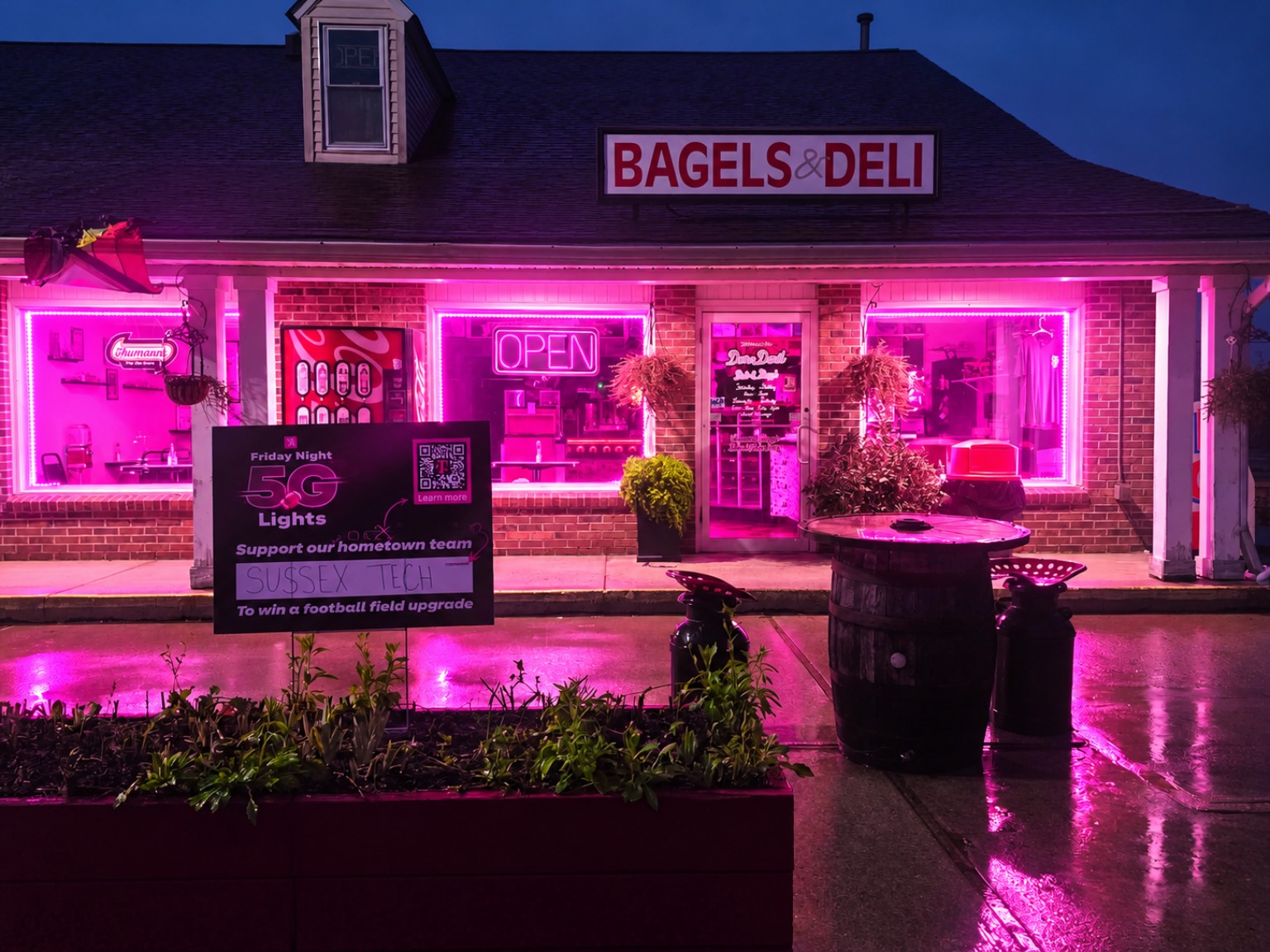 DareDevil Deli and Bagel glowing magenta in support of the Sussex Tech Mustangs Friday Night 5G Lights campaign