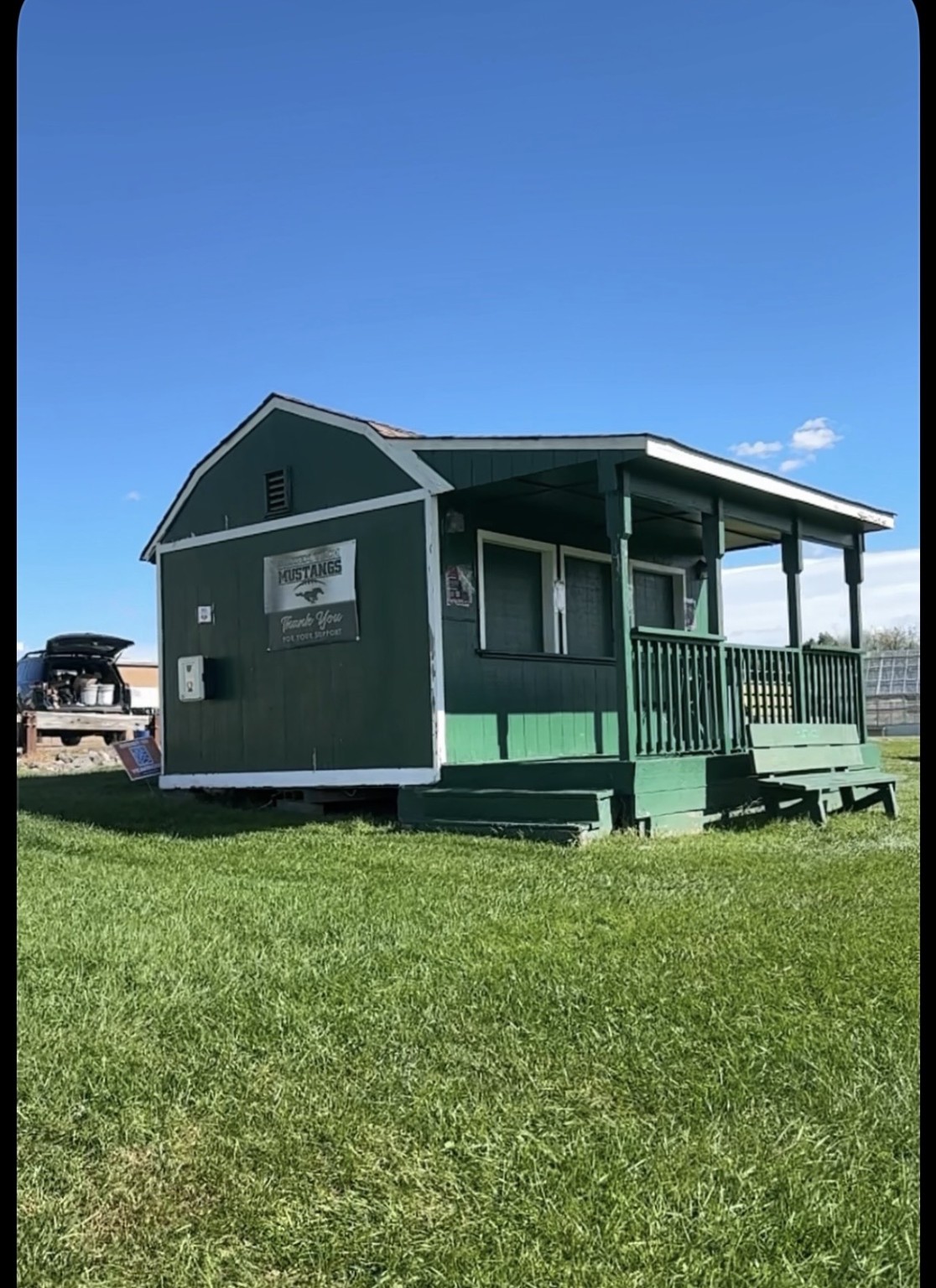 Before: the football field building painted Mustang green